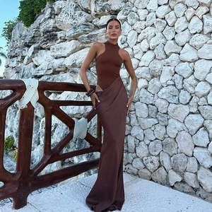 Detail view of the elegant hollow waist cutout and ruched draping on the brown maxi dress
