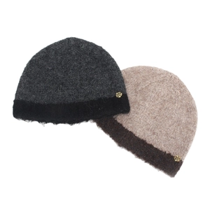 Retro mixed-color knit bucket hats for women featuring a small golden rose accent