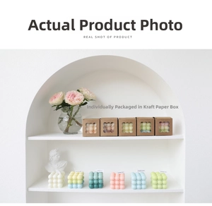Macaron color bubble cube candles displayed in a decorative arched niche shelf
