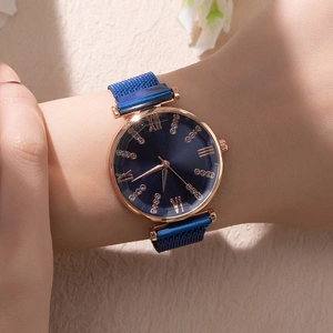 Fashionable women's quartz watch featuring Roman numerals and blue magnetic mesh band