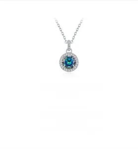 Macro shot of S925 silver necklace with 1ct colorful green moissanite pendant and zircons