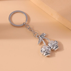 Gothic silver cherry skull keychain accessory for punk style bags and fashion outfits
