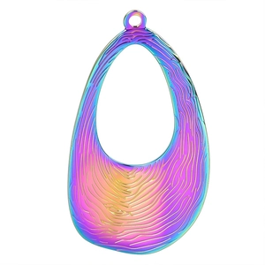 Macro shot of rainbow teardrop pendant with metallic wood grain texture and top bail