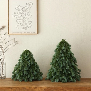 Realistic mini PE pine Christmas tree set on wooden table with elegant home decor