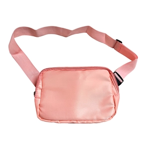 Pink minimalist nylon belt bag with adjustable strap for sports and casual crossbody wear