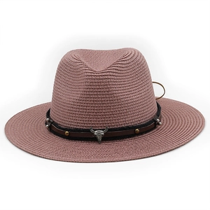 Pink woven straw fedora hat with a metal bull skull and hemp rope decoration
