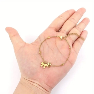 Gold stainless steel butterfly bracelet with initial K pendant and adjustable chain