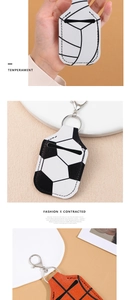 Detailed close-up of sport ball leather keychains with stitching and metal clasp