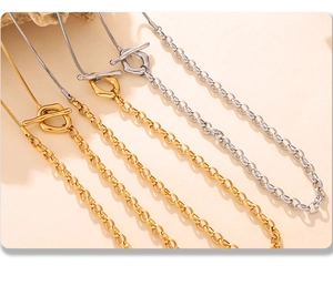 Detail view of two-tone stainless steel snake and link chain with OT toggle clasp