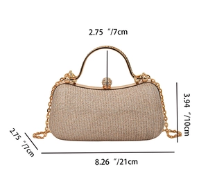 Detailed view of champagne gold evening clutch bag dimensions and rhinestone handle