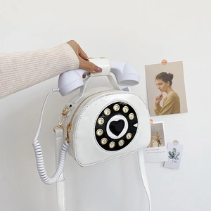 Creative white patent leather phone shaped crossbody bag with vintage dial and receiver detail