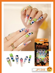 Detail of Halloween press-on nails featuring quirky eyeball designs and colorful oil drip art