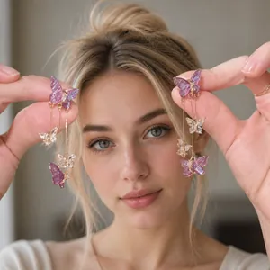 Detail of long butterfly tassel earrings with purple sequins and gold metal chains