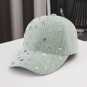 Light green corduroy baseball cap featuring silver 3D metal letter ornaments on crown