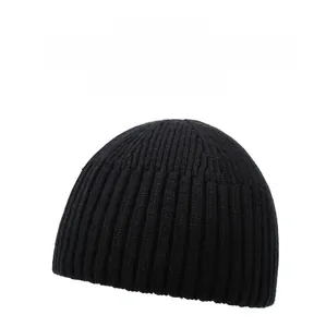 Detail shot of the black knitted beanie showing the classic vertical ribbed texture