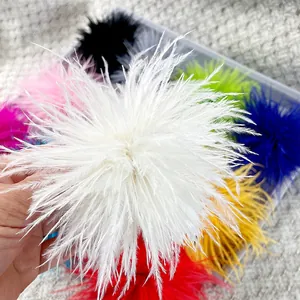Detailed close-up of fluffy ostrich feather brooches in assorted vibrant colors