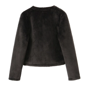 Detail view of the plush faux fur texture and back stitching of the dark brown jacket