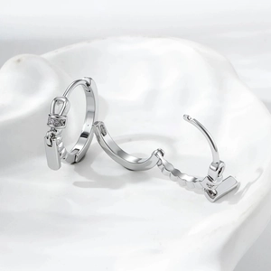 Minimalist silver zipper pull hoop earrings with cubic zirconia inlay for couples