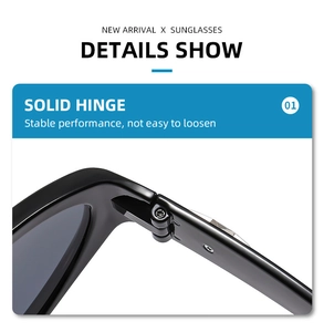 Detailed close-up of the solid metal hinge and glossy black frame on cat eye sunglasses