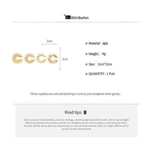 Detailed specs for C-shaped gold-tone earrings with twisted and textured patterns