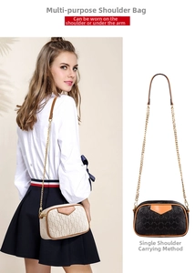 Close-up of geometric textured tote bag with golden chain strap in off-white and black