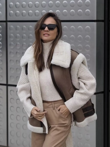 Y2K brown faux leather vest with white shearling trim and metal buckle detail