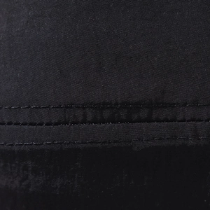 Detail of double stitching and twill texture on black quick-dry outdoor sun hat
