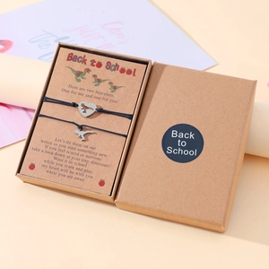 Handmade dinosaur mother and daughter bracelet set with heart cutout on card and gift box