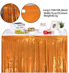 Detail view of gold tinsel table skirt showing 2.75M length and self-adhesive backing