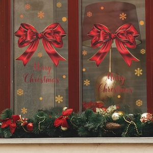 Stickers de Noël pour fenêtres avec nœuds rouges, flocons dorés et texte de vœux
