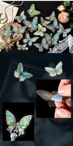Detailed macro of PET butterfly stickers featuring gold stamping and shell light texture