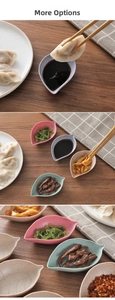 Leaf-shaped wheat straw seasoning dishes with vein textures in Morandi colors on wood