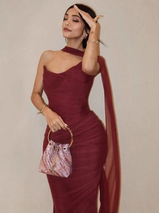 Elegant burgundy mesh ruched evening dress with one-shoulder design and sequin handbag