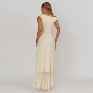 Elegant beige one-shoulder dress featuring slim fit waist and mesh patchwork hem detail