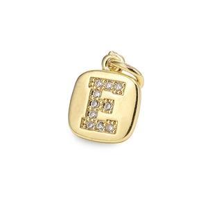 Detailed view of a gold-plated letter E pendant with clear zircon cubic stones
