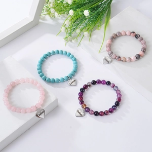 Customized natural stone beaded bracelets with heart pendants in multiple colors