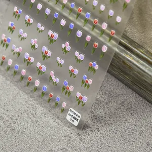 Macro shot of 5D embossed tulip nail art stickers with colorful floral patterns TO1485