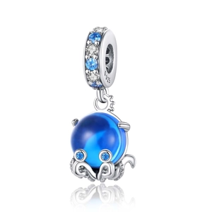 Detailed close-up of a silver octopus pendant with blue gemstones and S925 hallmark