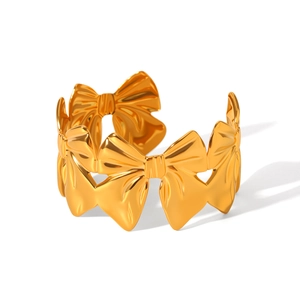 Bracciale rigido aperto in acciaio inossidabile oro 18K con elementi a fiocco 3D
