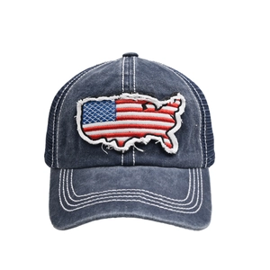 Detail of navy trucker hat with American flag map patch and contrast white stitching