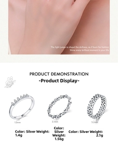 Detailed view of S925 sterling silver rings with zircon crowns and heart designs