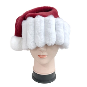 Close-up of thick plush Santa hat with distinct vertical stripes and white faux fur trim