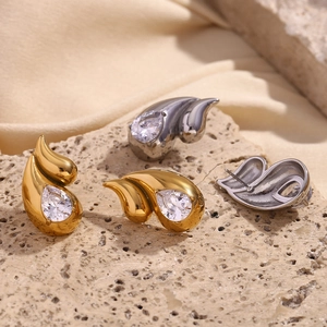 18K gold and silver teardrop stud earrings with pear-cut cubic zirconia on stone base