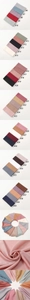 Detailed view of color palette for soft silk-feel bubble satin scarves in solid tones
