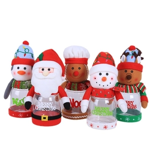 Set of 5 Christmas character candy jars with Santa, Snowman and Reindeer doll lids