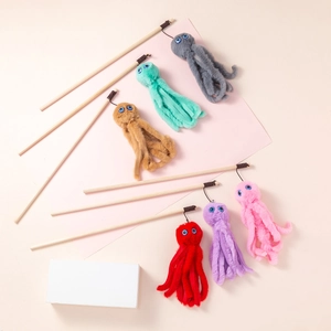 Detailed view of plush octopus cat wands with wooden sticks in six vibrant colors