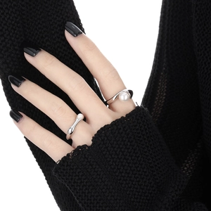 Elegant S925 sterling silver geometric rings set with inlaid pearls on a model hand