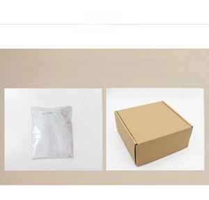 Detail of bridal veil packaging featuring a protective OPP bag and sturdy shipping carton
