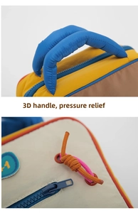 Detail of multi-color padded handles and durable nylon zipper on a travel cosmetic bag