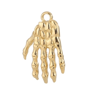 Detailed close-up of golden stainless steel skeleton hand pendant with vintage texture